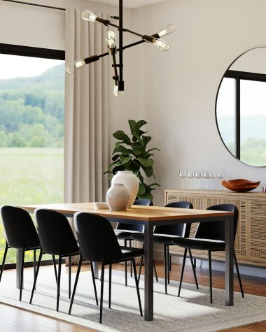 a dining room table in front of a window