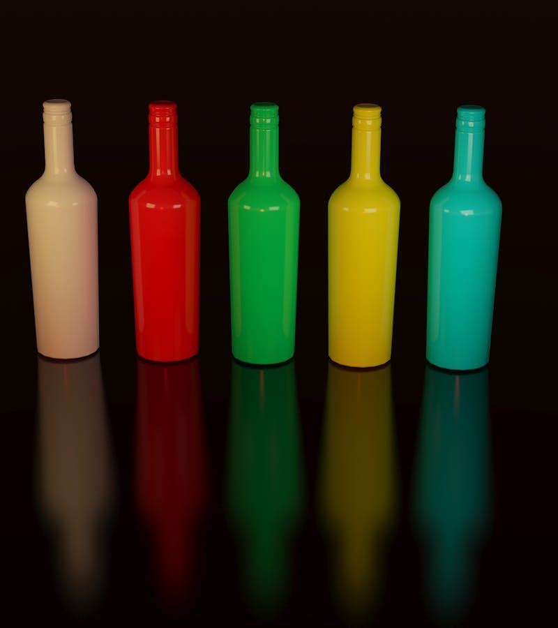 Five Bottles on Black Surface